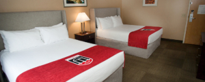 Alumni Queen Suite bedroom UGA hotel