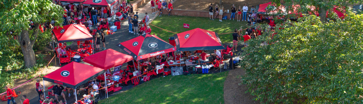 Tailgaters on Lumpkin Plaza outside the Georgia Center